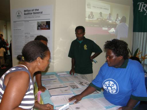 OAG Branch Manager Joyce Mesepitu (R) speaking with a member of the public (Photo OAG)